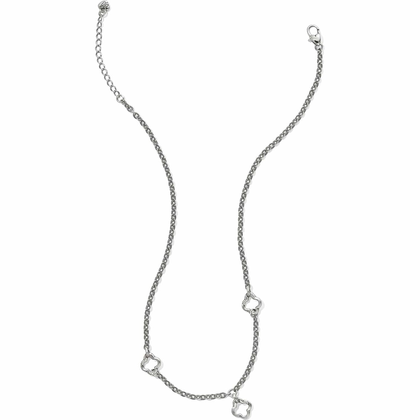 Brighton silver-plated station necklace with textured chain links and open quatrefoil accents with lobster clasp on a white background