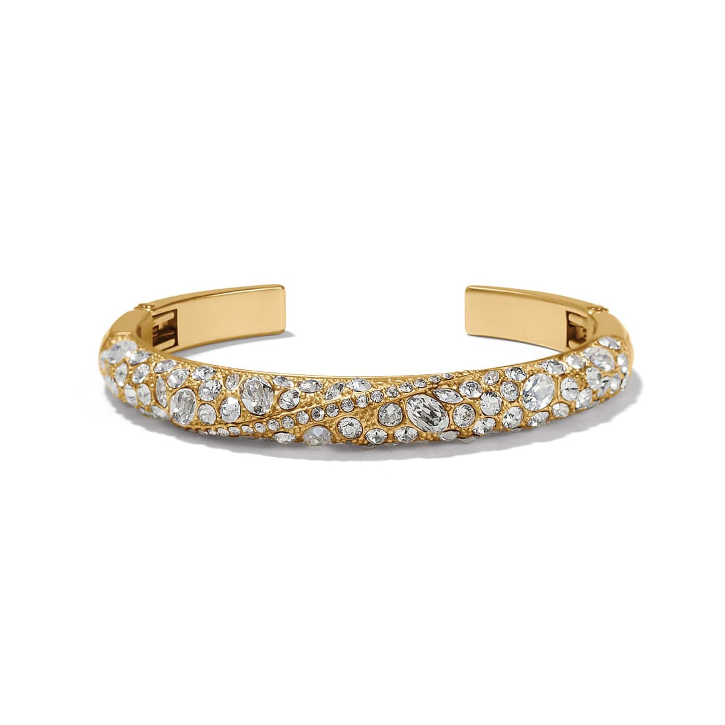 Brighton cuff bracelet with gold-plated finish and pavé fine quality crystals in varied sizes on a white background