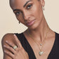 Model wearing a Brighton gold-plated crystal heart pendant necklace with coordinating Brighton accessories including earrings and ring