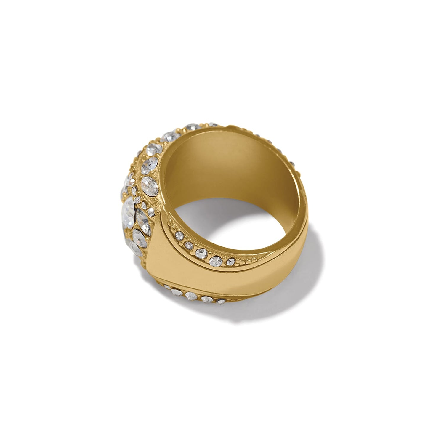 Brighton gold-plated ring shown from the side with pavé crystal dome and crystal-lined band on a white background