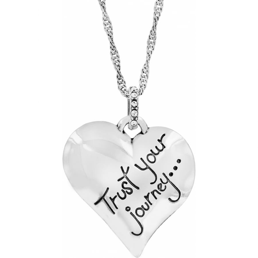 Brighton heart pendant necklace with silver-plated finish, engraved "Trust Your Journey" message, and crystal accents on a white background