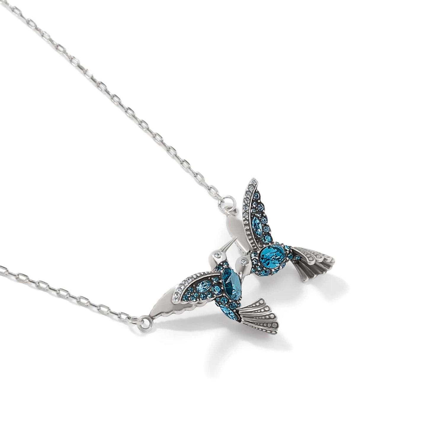 Brighton silver-plated hummingbird pendant necklace with blue crystals and detailed wing accents on a white background