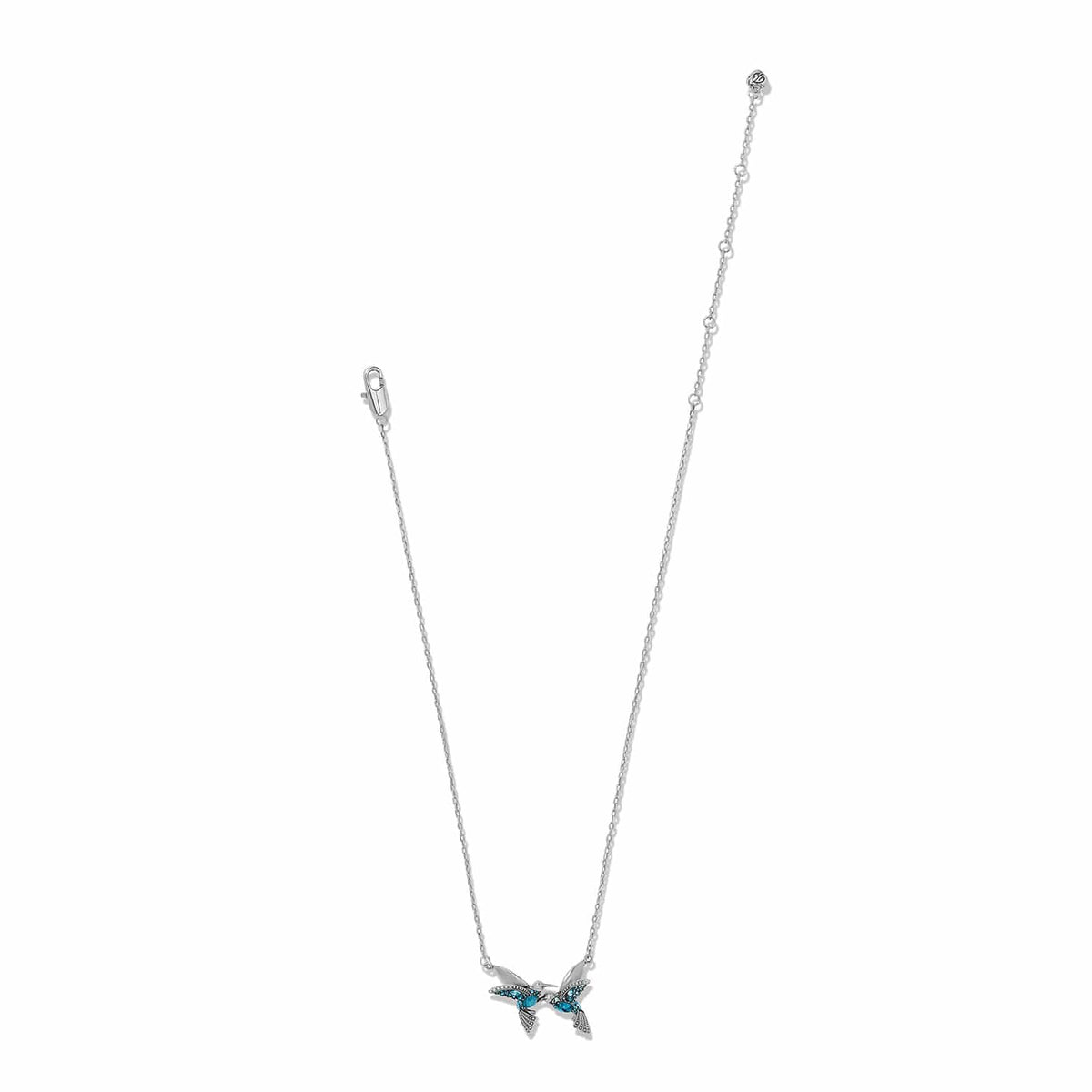 Brighton silver-plated hummingbird necklace with blue crystal accents and lobster clasp on a white background