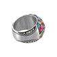Brighton ring with multicolored crystals and silver-plated band with crystal accents along the sides on a white background