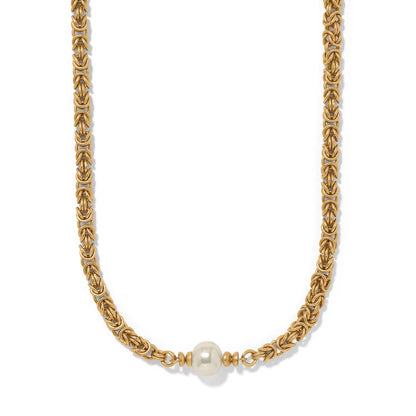 Brighton gold-plated Byzantine chain necklace with single Japanese Baroque pearl centerpiece on a white background