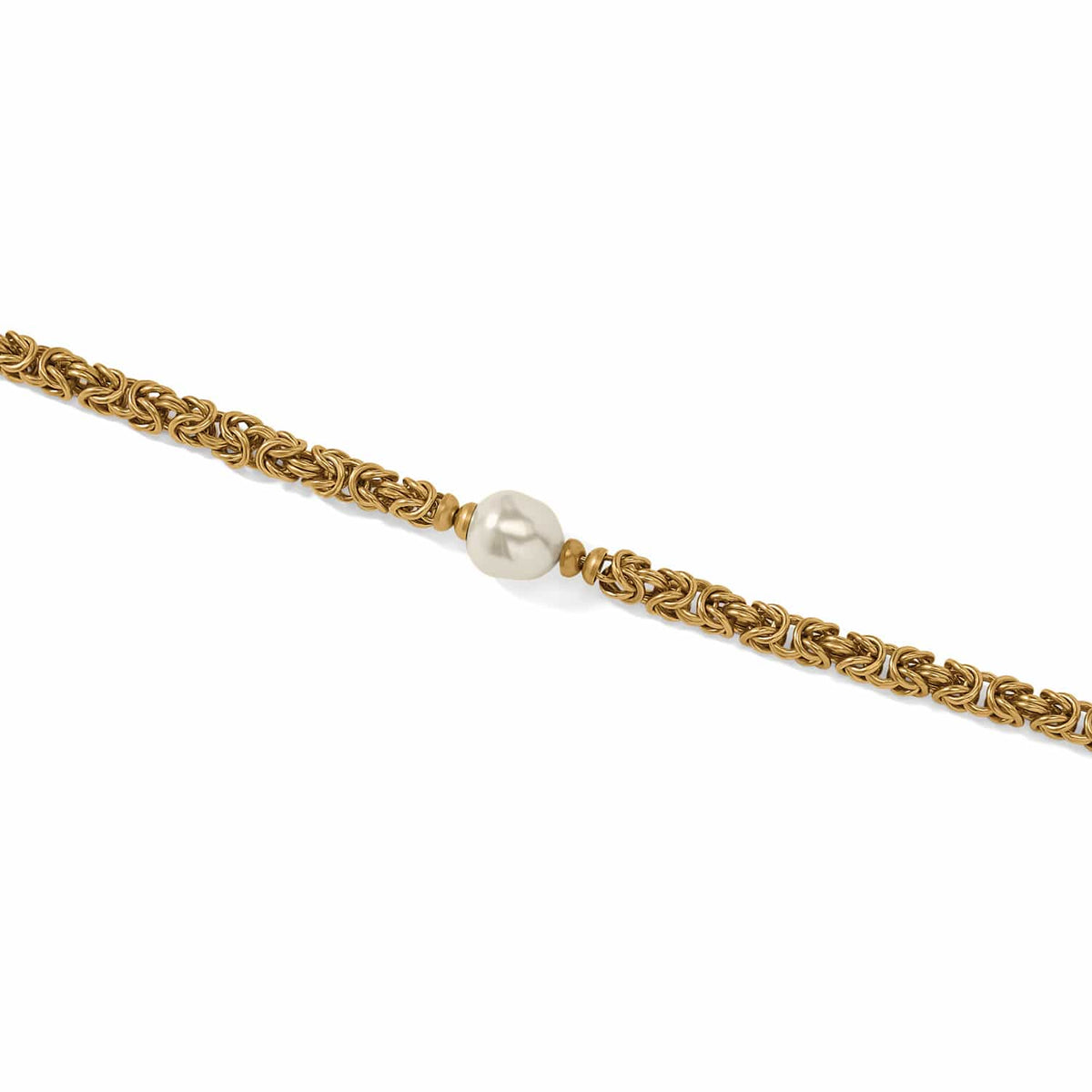 Brighton gold-plated byzantine chain bracelet with single Japanese baroque pearl accent at center on a white background