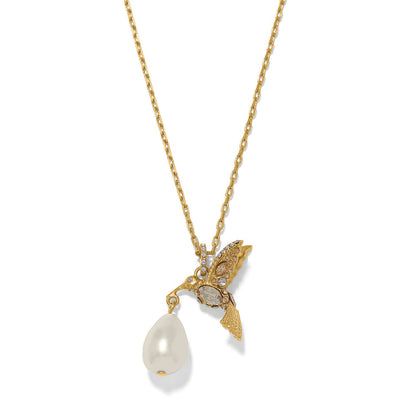 Brighton pendant necklace with gold-plated hummingbird, crystal accents, and baroque pearl drop on a white background