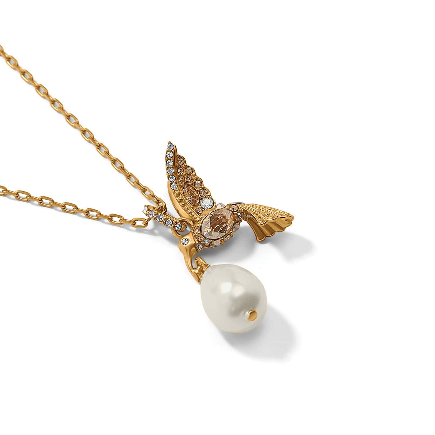 Brighton gold-plated pendant necklace with hummingbird design, crystal accents, and baroque pearl drop on a white background