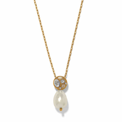 Brighton pendant necklace with gold-plated crystal cluster and baroque pearl drop on a white background