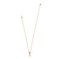 Brighton gold-plated pendant necklace with crystal-accented sphere and baroque pearl drop on a white background