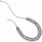 Brighton silver-plated necklace and bracelet set with crystal floral links and chain extenders on a white background
