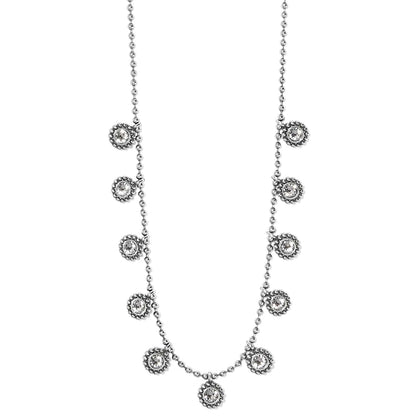 Brighton necklace with silver-plated beaded chain and crystal floral station accents spaced along the strand on a white background