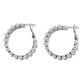 Brighton hoop earrings with silver-plated beaded design and hinged post closures on a white background
