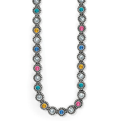 Brighton necklace with multicolored crystals in silver-plated beaded settings along a continuous chain on a white background