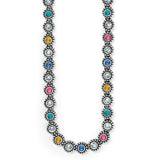 Brighton necklace with multicolored crystals in silver-plated beaded settings along a continuous chain on a white background