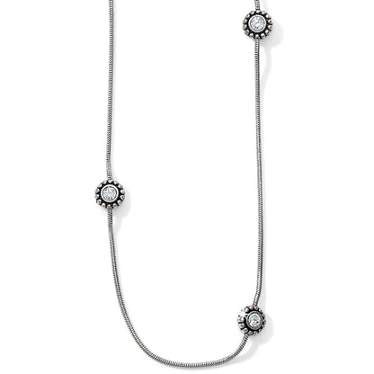 Brighton silver-plated station necklace with three round crystal accents framed by beaded detailing on a white background