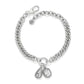 Brighton silver-plated curb chain bracelet with teardrop and emerald-cut crystal charms on a white background