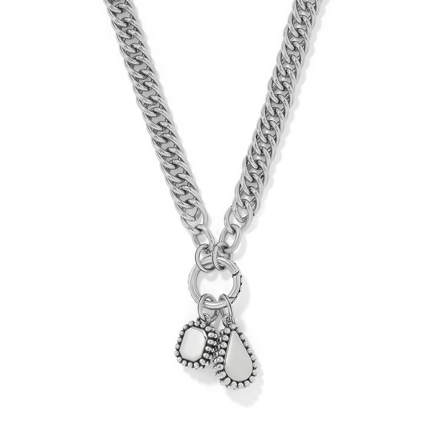 Brighton silver-plated curb chain necklace with hexagon and teardrop charms featuring beaded edges on a white background