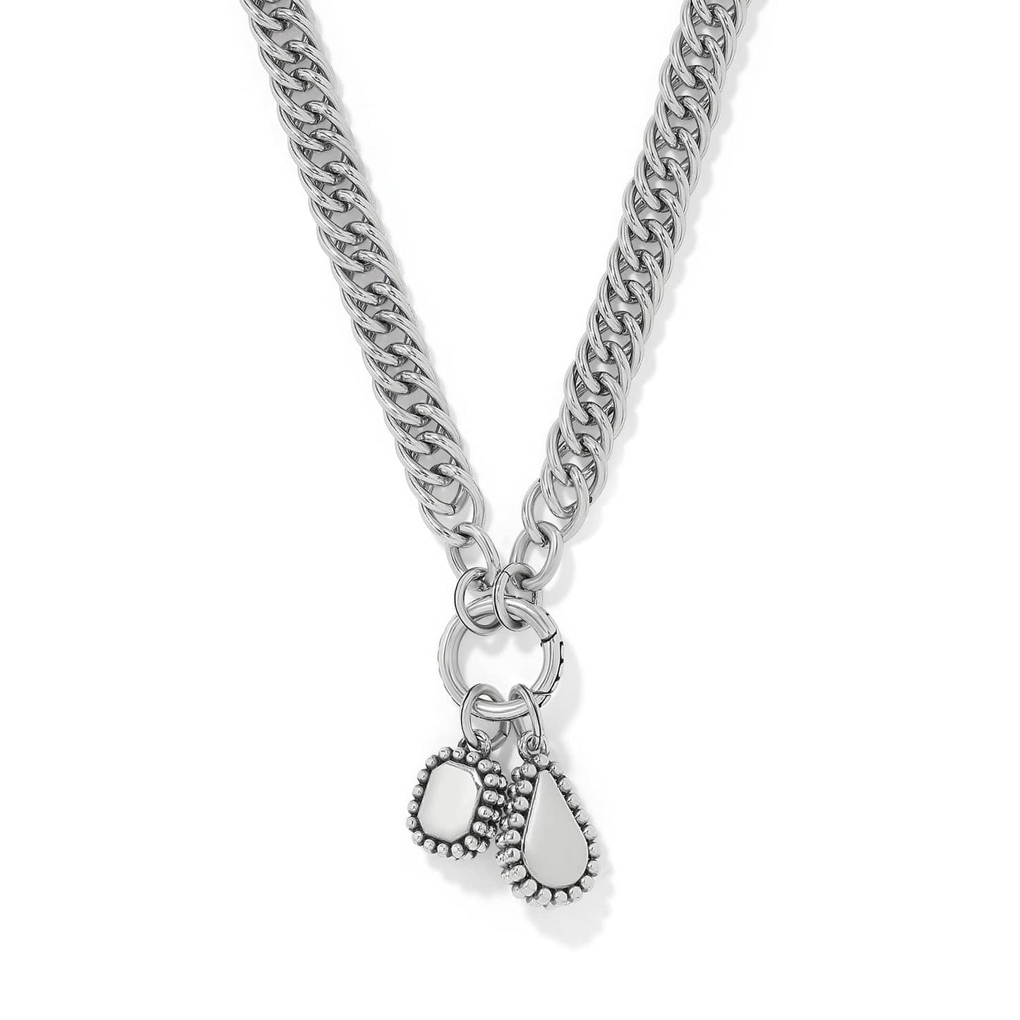 Brighton silver-plated curb chain necklace with hexagon and teardrop charms featuring beaded edges on a white background