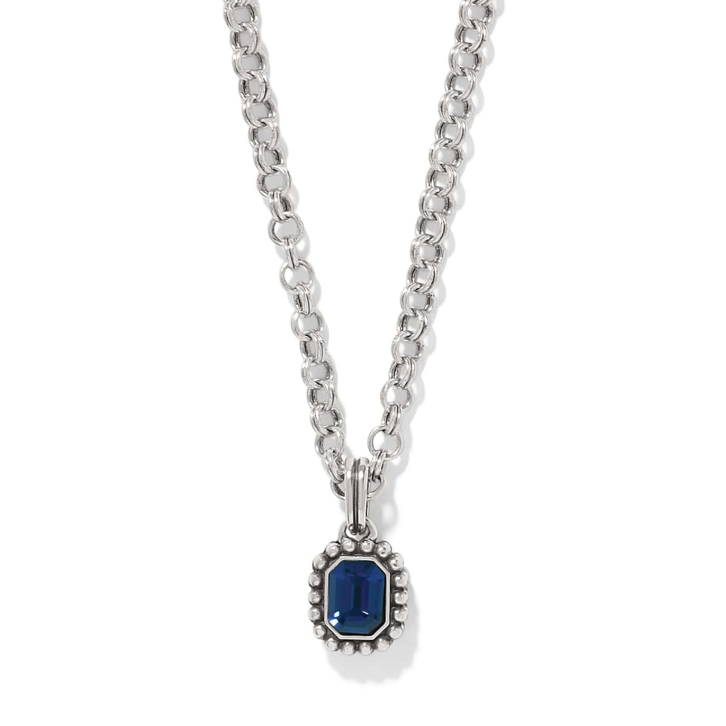 Brighton pendant necklace with emerald-cut blue crystal and beaded silver-plated frame on a white background