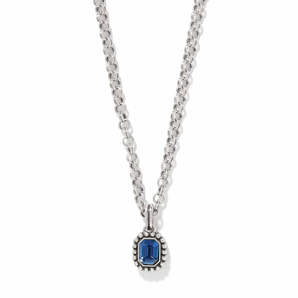 Brighton pendant necklace with blue crystal in silver-plated beaded frame on rolo chain on a white background