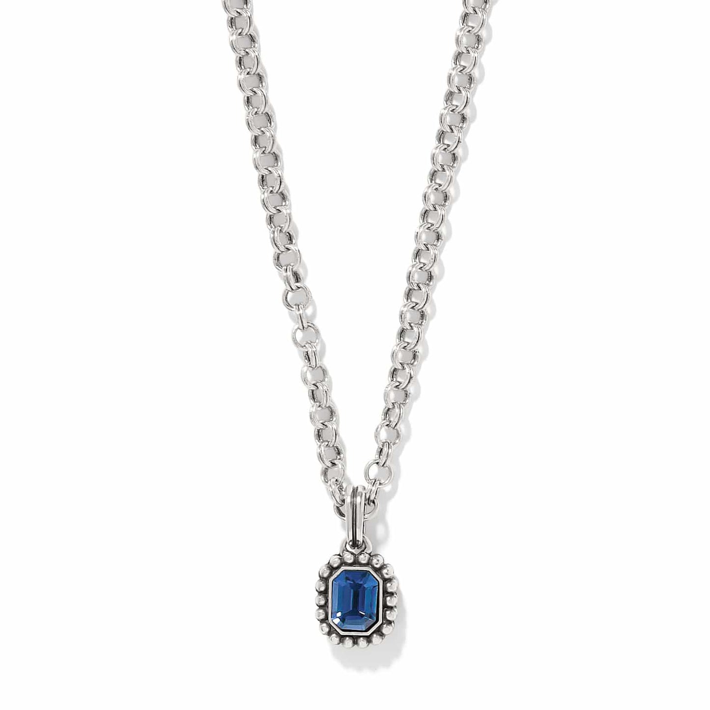 Brighton pendant necklace with blue crystal in silver-plated beaded frame on rolo chain on a white background