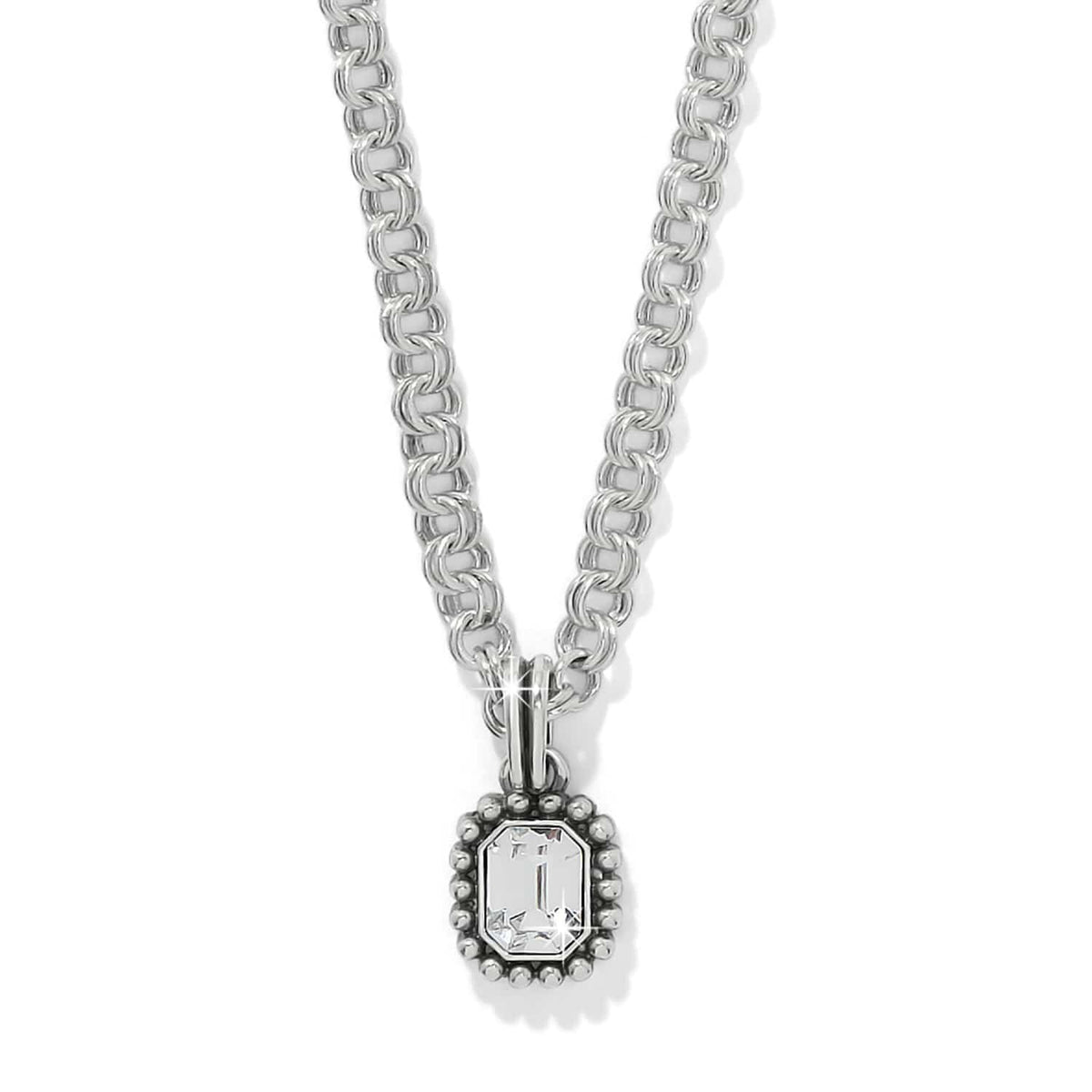 Brighton pendant necklace with emerald-cut crystal in beaded silver-plated frame on rolo chain on a white background