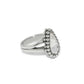 Brighton ring with pear-shaped crystal centerpiece, silver-plated beaded halo, and split shank band on a white background