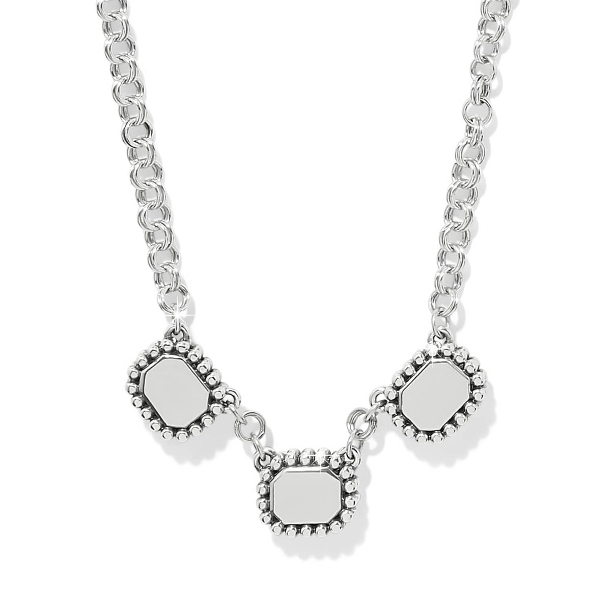 Brighton silver-plated necklace with three octagonal stations and beaded edge details on a white background