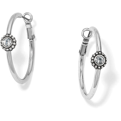 Brighton silver-plated hoop earrings with beaded floral crystal accents on each hoop on a white background