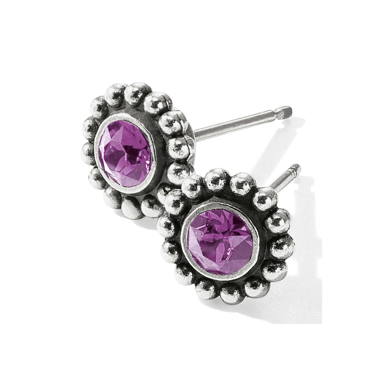 Brighton stud earrings with purple crystals and silver-plated beaded edges on a white background