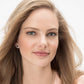 Model wearing Brighton silver-plated stud earrings with black center stones surrounded by fine quality crystals
