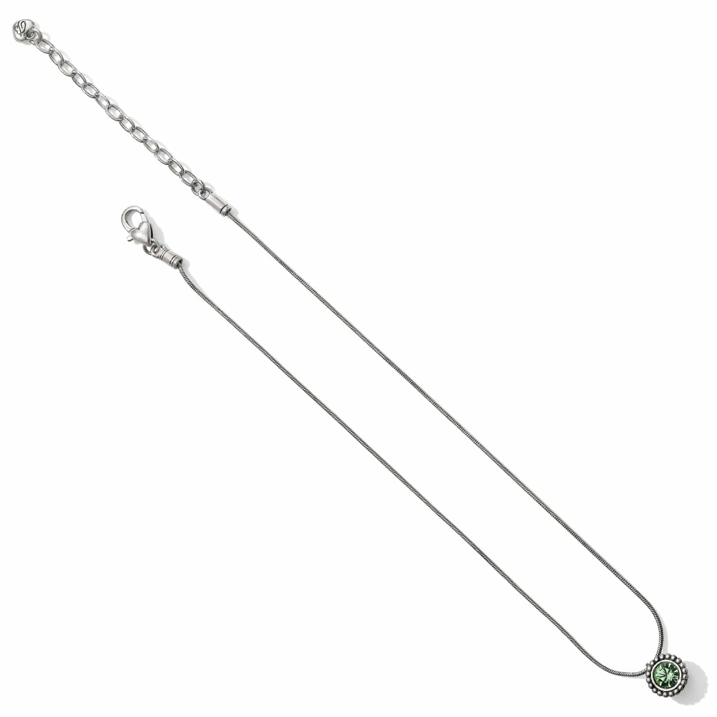 Brighton silver-plated pendant necklace with green crystal, snake chain, and adjustable extender on a white background