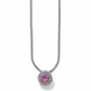 Brighton pendant necklace with round purple crystal and silver-plated beaded frame on snake chain on a white background