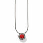 Brighton pendant necklace with red crystal center and beaded silver-plated frame on snake chain on a white background