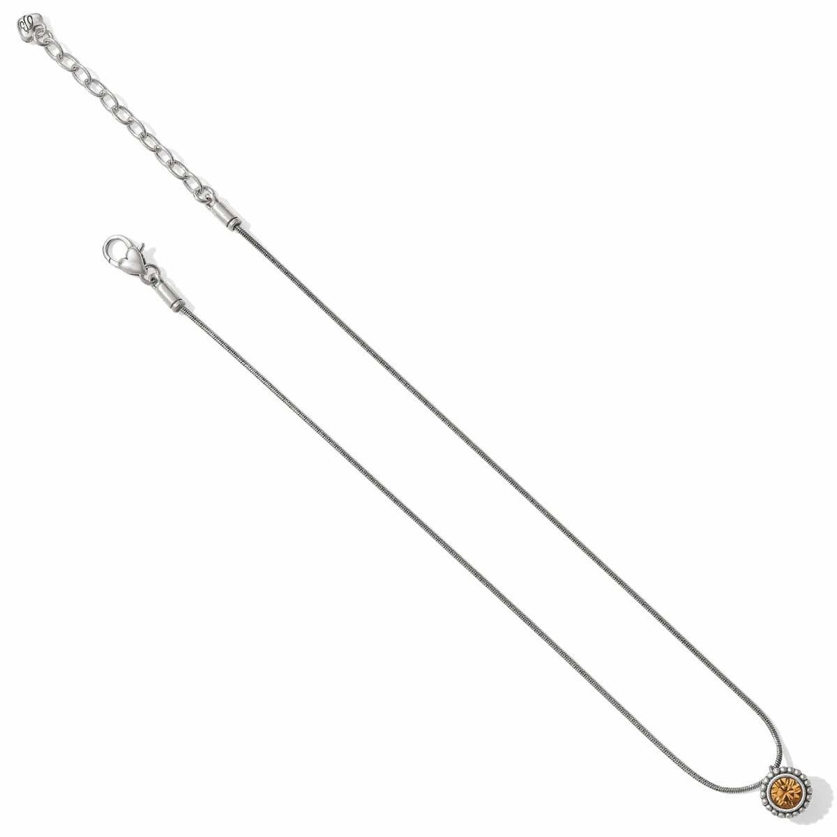 Brighton silver-plated pendant necklace with amber crystal and beaded frame, featuring extender chain on a white background