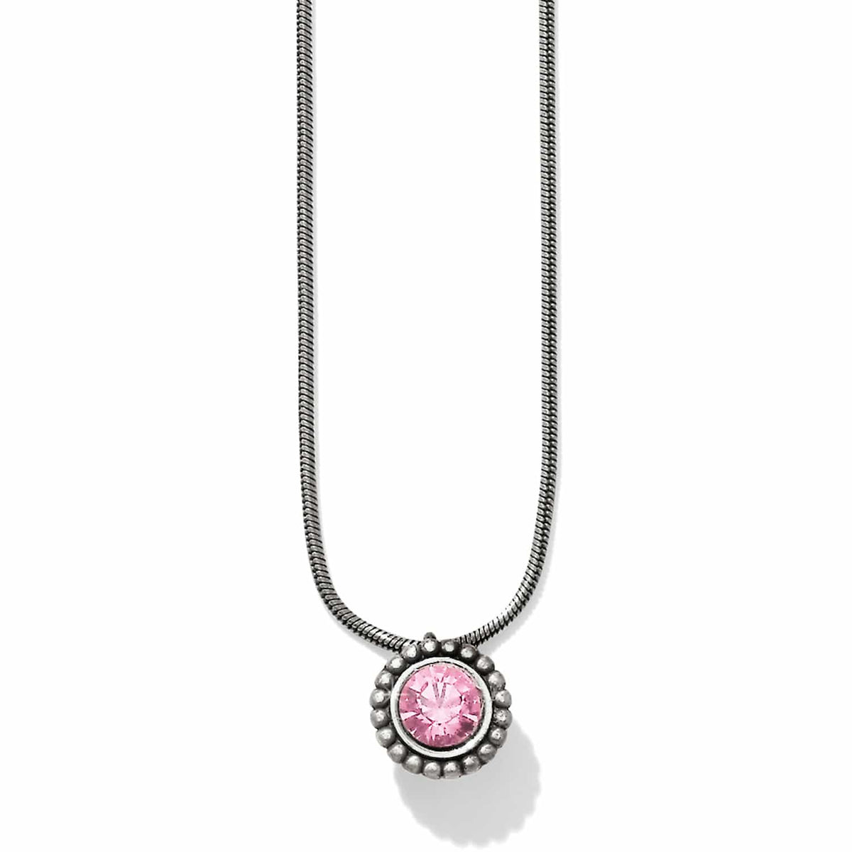 Brighton pendant necklace with pink crystal and beaded silver-plated frame on snake chain on a white background