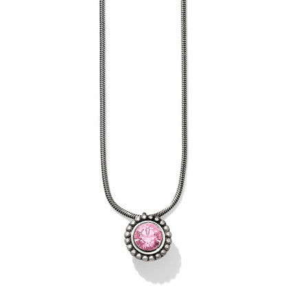 Brighton pendant necklace with pink crystal and beaded silver-plated frame on snake chain on a white background