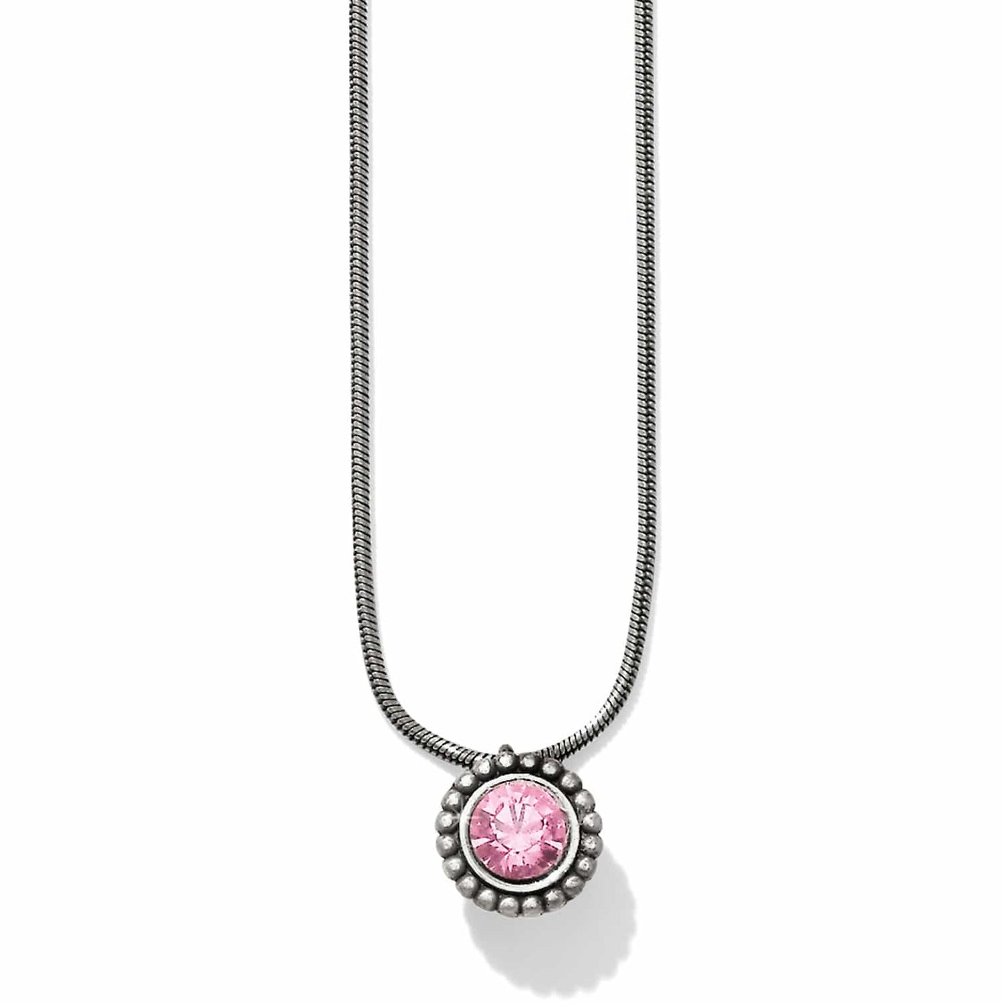 Brighton pendant necklace with pink crystal and beaded silver-plated frame on snake chain on a white background