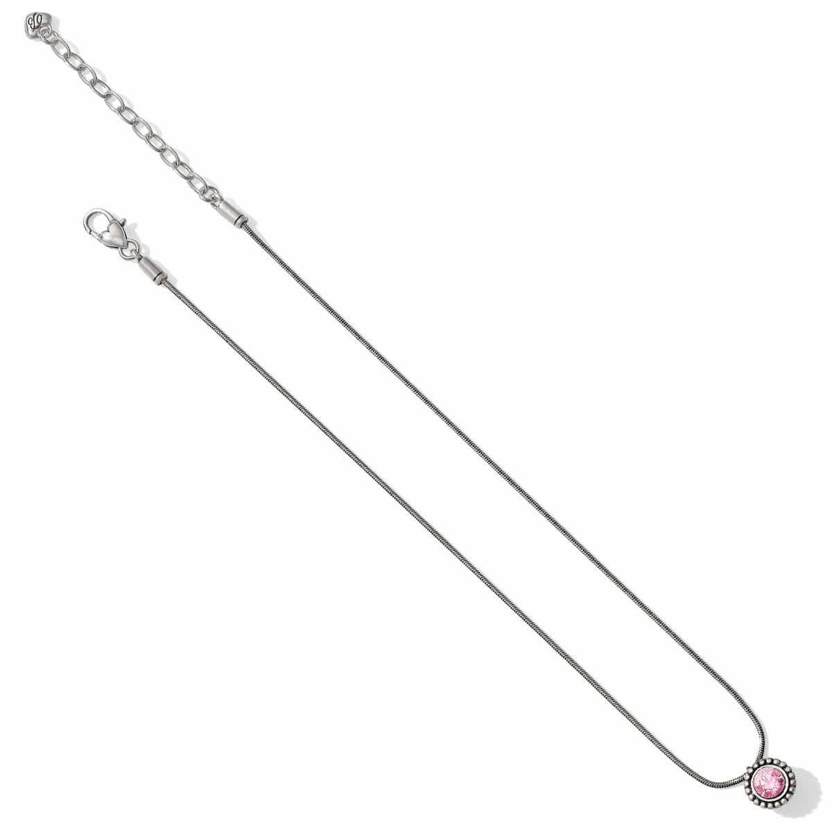 Brighton pendant necklace with pink crystal and silver-plated snake chain with adjustable extender on a white background