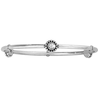 Brighton silver-plated bangle bracelet with central crystal medallion and beaded accents on a white background