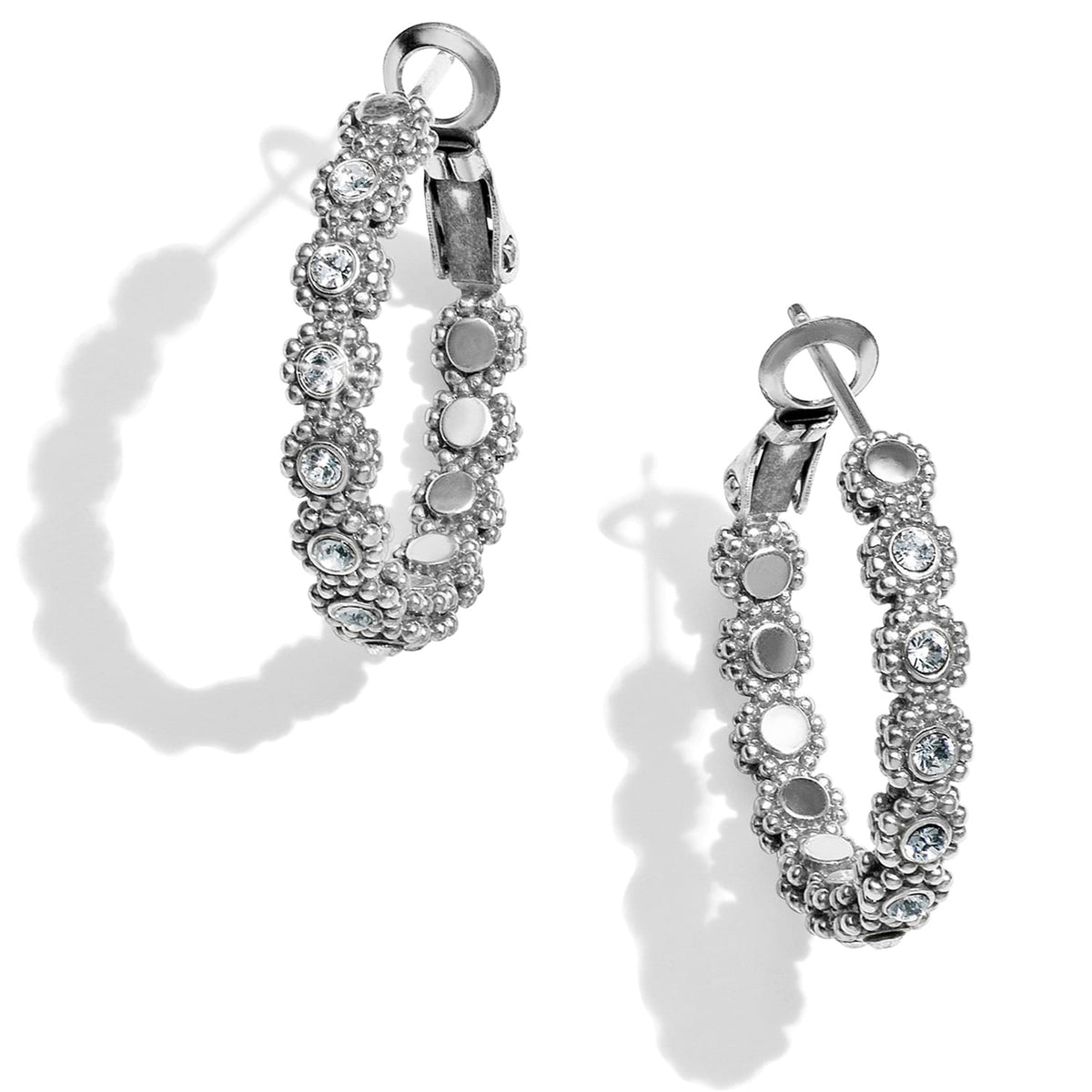Brighton hoop earrings with silver-plated beaded texture and crystal accents around the hoops on a white background