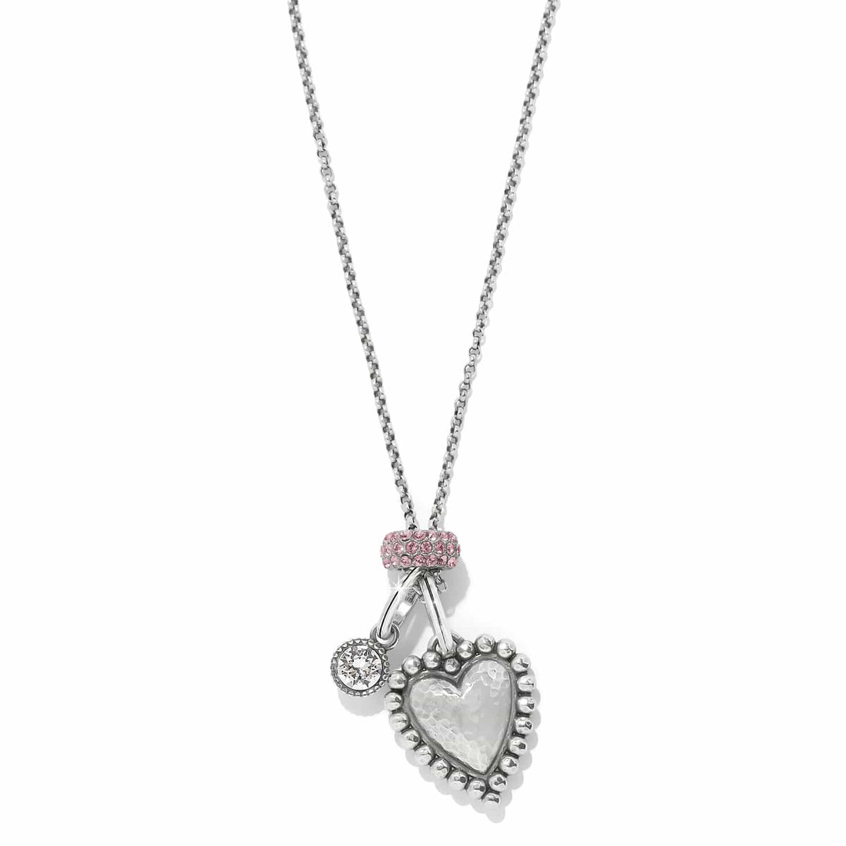 Brighton pendant necklace with hammered silver-plated heart, crystal charm, and pink crystal bail on a white background