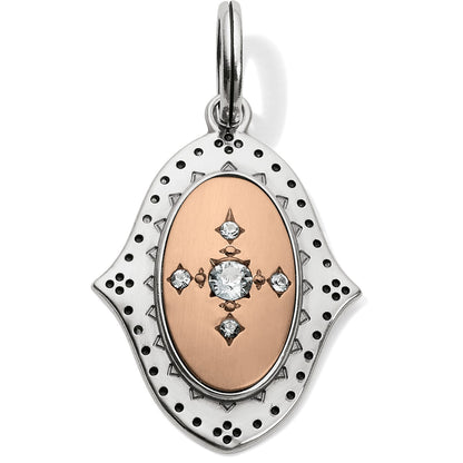 Brighton oval charm with two-tone finish, rose gold center, crystal accents, and silver beaded border on a white background