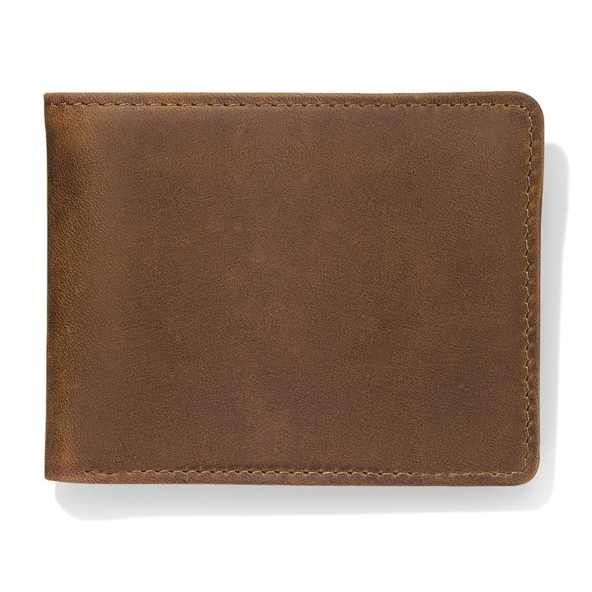 Brighton bifold wallet in brown leather with visible stitching along the top and right edges on a white background