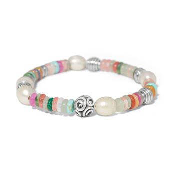Brighton beaded bracelet with glass pearls, fuchsia dyed jade, mixed gemstones, and silver-plated accents on a white background