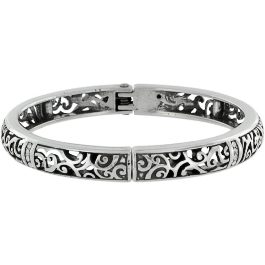 Brighton hinged bangle bracelet with silver-plated openwork scroll design and crystal accents on a white background