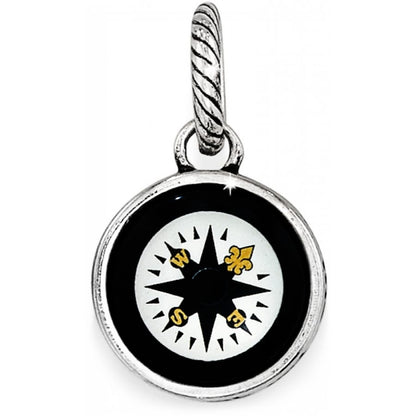 Brighton compass charm with black enamel border and silver-plated rope bail on a white background