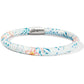Brighton leather bracelet with light blue floral and seashell print and silver-plated magnetic clasp on a white background