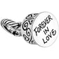 Brighton charm with silver-plated round Forever In Love engraved medallion and scrollwork detailing on a white background